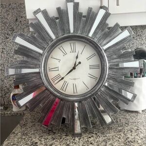 Elegant Gray Sunburst Wall Clock